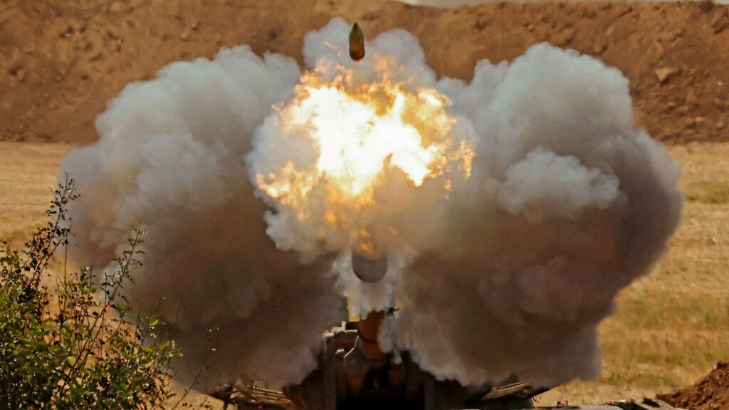Israeli soldiers fire a 155mm self-propelled howitzer towards the Gaza Strip from their position along the border in the southern Israeli city of Sderot on Thursday. Photograph: JACK GUEZ / AFP via Getty Images