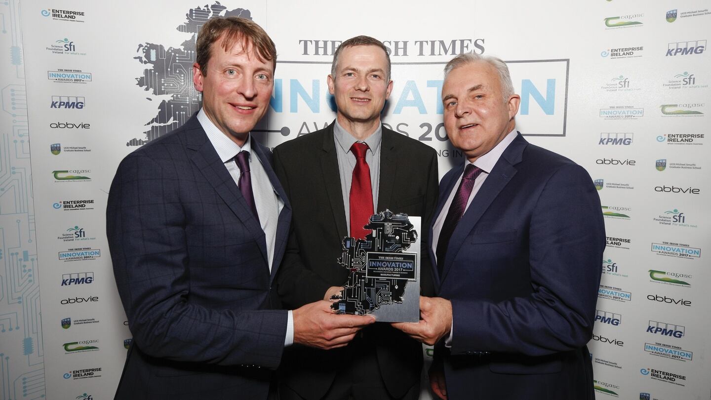 Todd Manning, AbbVie Ireland, presenting the award for Manufacturing to Martin Cahill and Hugh Maguire from Ash Technologies Ltd. Photograph: Conor McCabe Photography