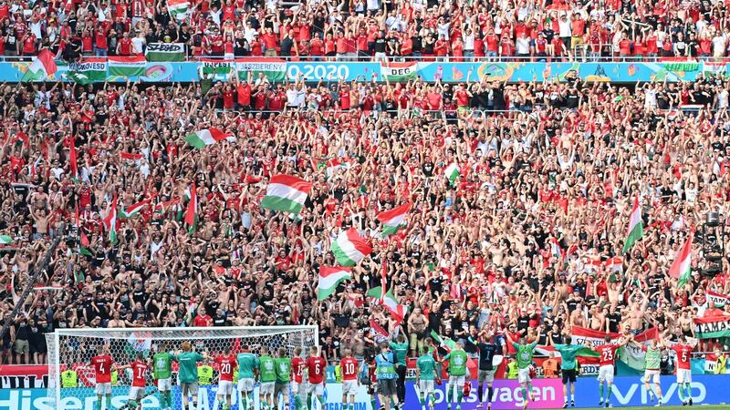 Hungary’s players and supporters celebrate after their 1-1 draw with France. Photograph: Tibor Illyes/Getty/AFP