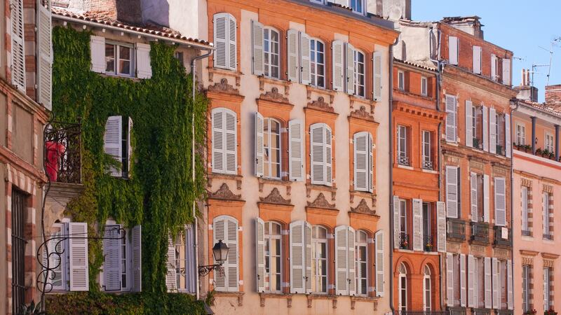 Facades on a typical square in Toulouse, France