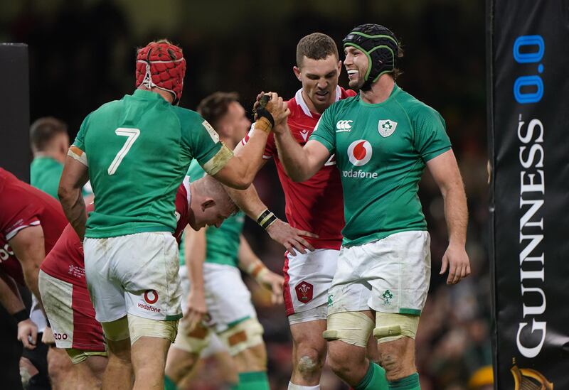 Ireland's Josh Van Der Flier celebrates the game-clinching try with Caelan Doris in Cardiff. Photograph: PA