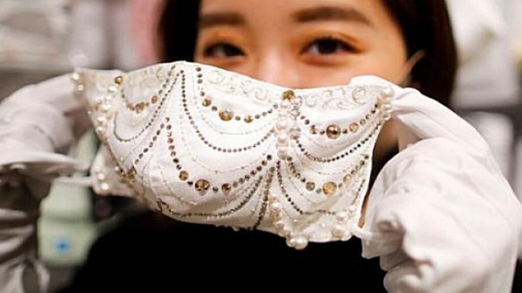 The masks are embellished with diamonds and crystal. Photograph: Reuters