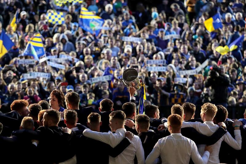 The players celebrate with the Liam McCarthy cup at the Tipperary homecoming in Semple Stadium, Thurles. Photograph: Laszlo Geczo/Inpho