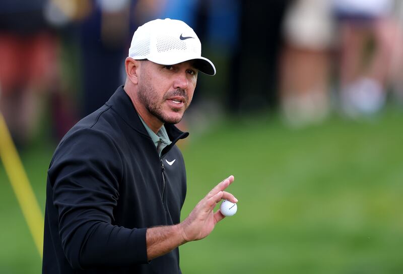 Brooks Koepka acknowledges the crowd on the ninth green at the K Club. Photograph: Warren Little/Getty