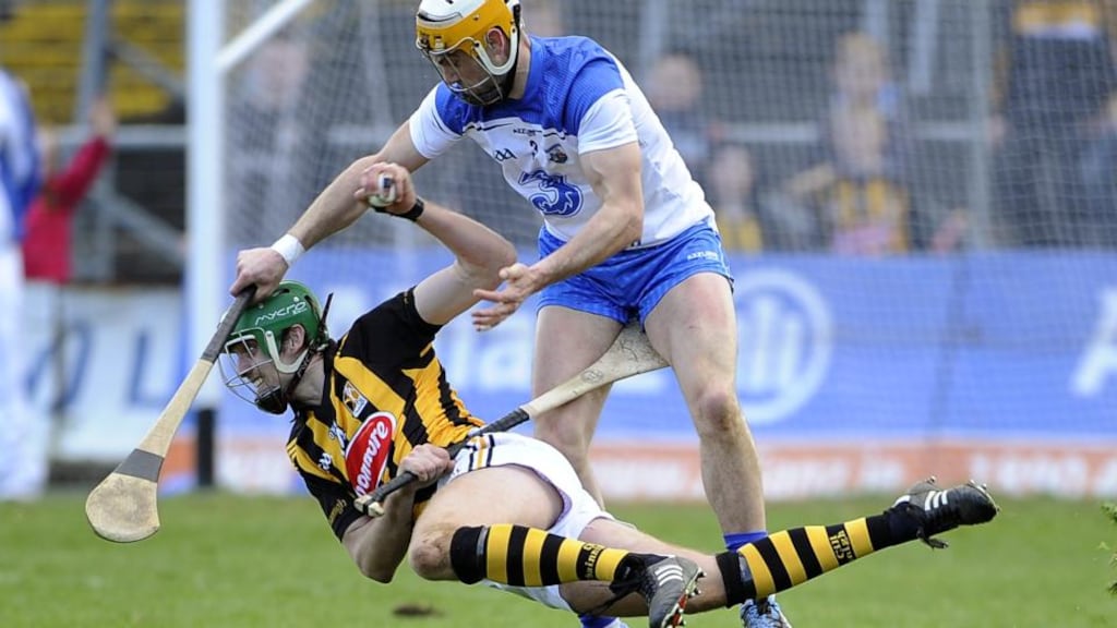 Kilkenny’s Mark Kelly battles with Shane Fives of Waterford at Nowlan Park last Sunday. Photo: Tommy Grealy/Inpho