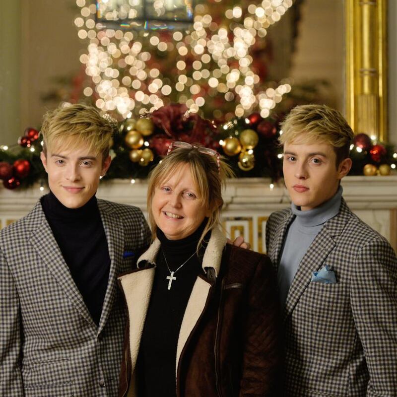 Jedward with their mother Susanna in the Merrion Hotel in 2013. Photograph: Alan Betson