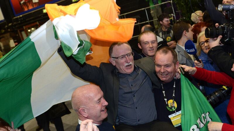 Sinn Féin Dublin North-West candidate Dessie Ellis celebrates in advance of the anticipated election result at the RDS. Photograph: Dave Meehan/The Irish Times