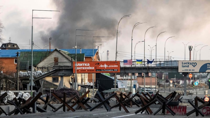 In this file photo taken on March 18, 2022 this photograph taken shows smoke rising after an explosion in Kyiv. - Photograph: Fadel Senna/Afp via Getty Images