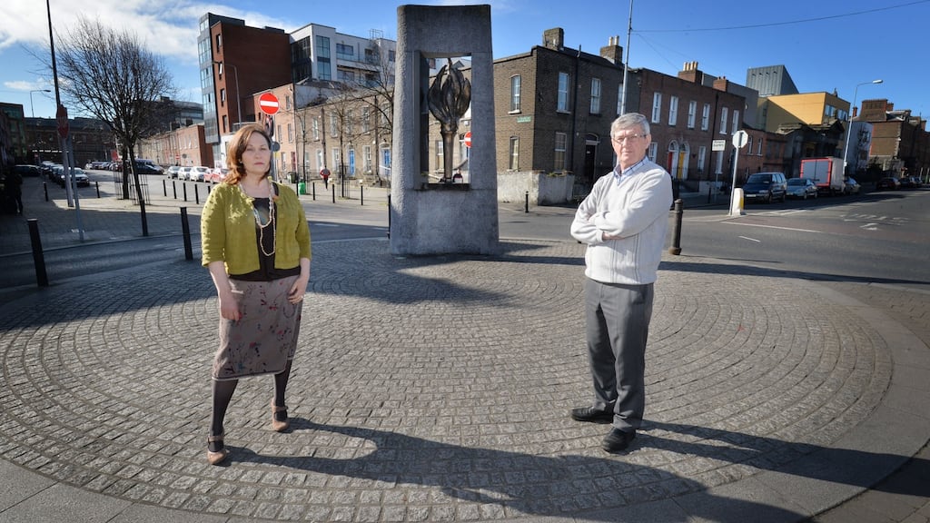 Irene Crawley and Joe Dowling from Hands on Peer Education (Hope) at the memorial on the corner of Seán McDermott Street and Buckingham Street in Dublin. Photograph: Alan Betson