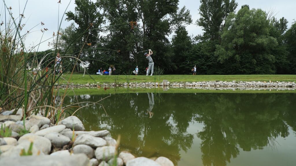 Gavin Moynihan of Ireland plays his third shot on the 8th hole at the 2018 Shot Clock Masters at Diamond Country Club in Atzenbrugg, Austria. Photo: Matthew Lewis/Getty Images