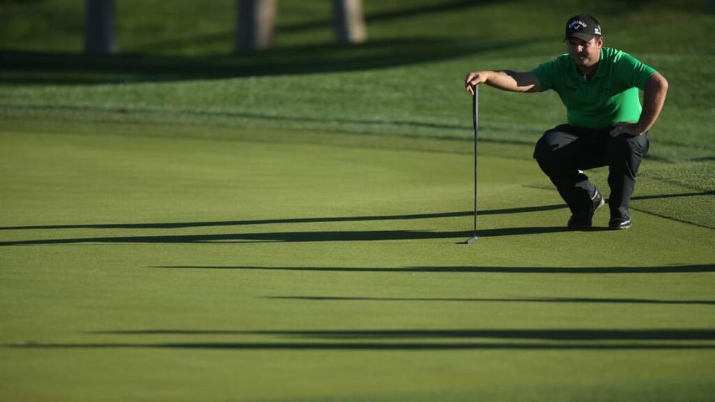 Patrick Reed lines up a putt on the ninth hole of the Arnold Palmer Course at PGA West during the first round of the Humana Challenge in La Quinta, California. Photograph: Jeff Gross/Getty Images