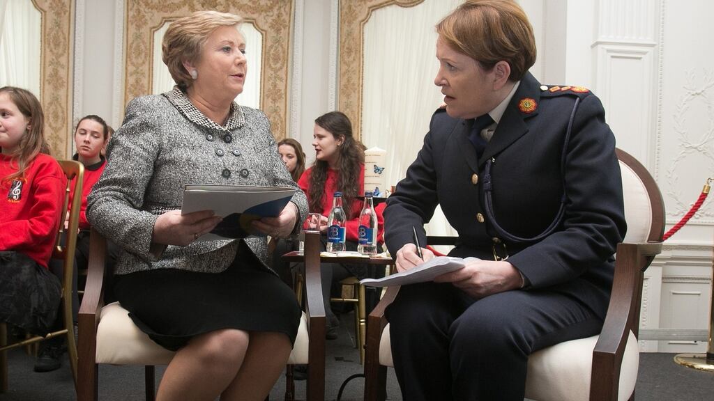 Minister for Justice Frances Fitzgerald and Garda Commissioner Nóirín O’Sullivan: report said a fresh injection of frontline resources could come about through restructuring. Photo: Gareth Chaney/Collins