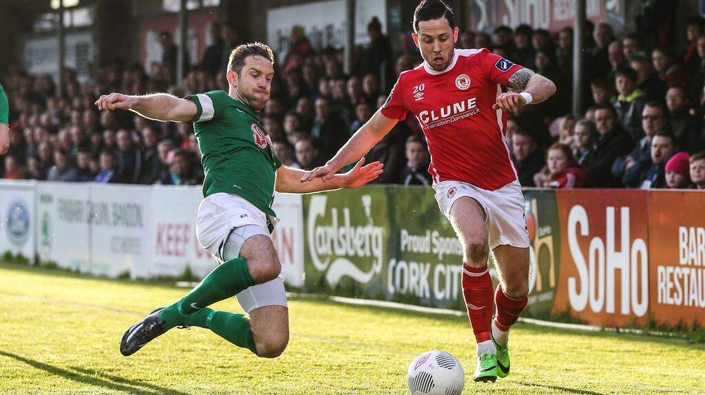 Cork City’s Alan Bennett challenges Billy Dennehy of St Patrick’s Ahletic during the SSE Airtricity League Premier Division match at Turner’s Cross. Photograph: Cathal Noonan/Inpho