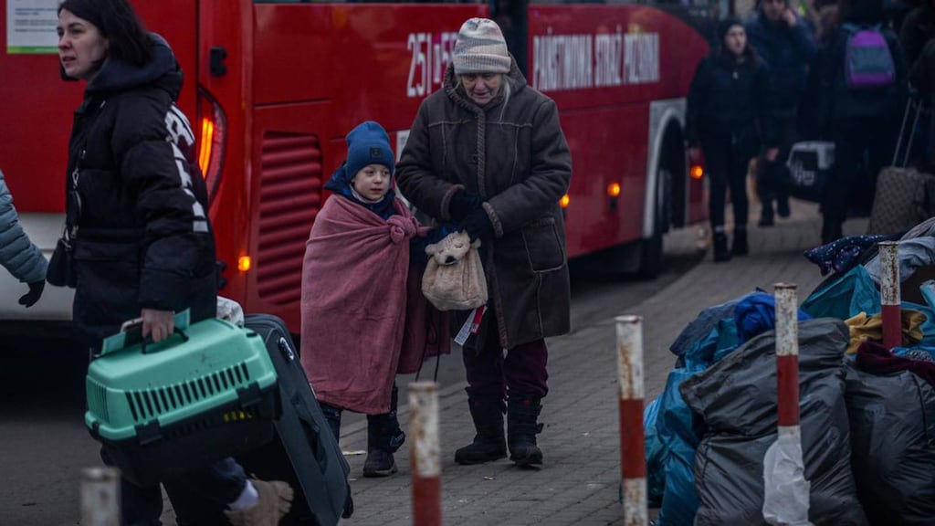 A woman and a child fleeing Ukraine: For Beneficiaries of Temporary Protection – those arriving from Ukraine – there could be a shortfall of 8,024 places by March. Photograph: Omar Marques