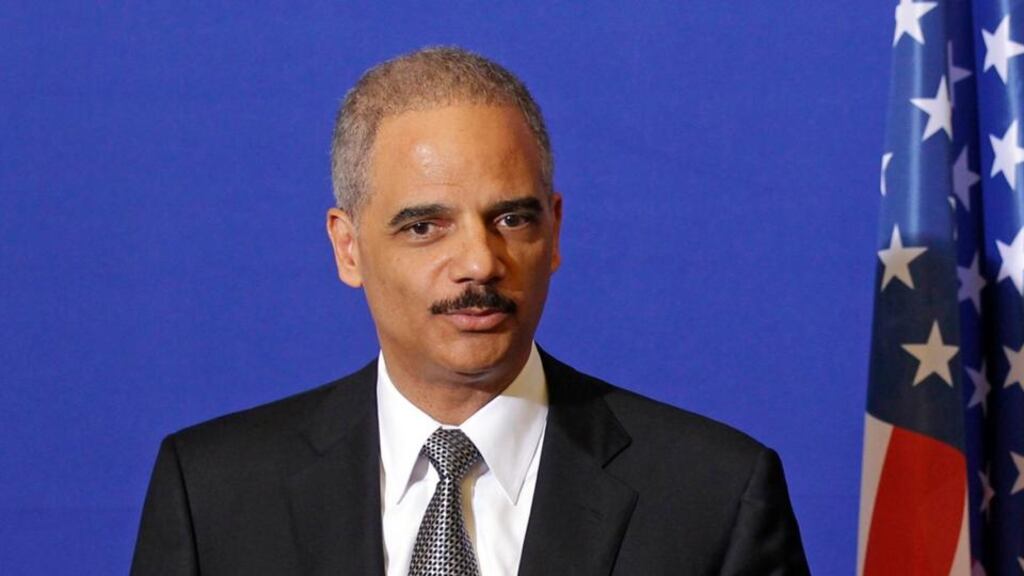 US attorney general Eric Holder has announced that criminal charges have been brought against three men for their alleged involvement in a Russian spy ring operating in New York City. Photograph: Benoit Tessier/Reuters.
