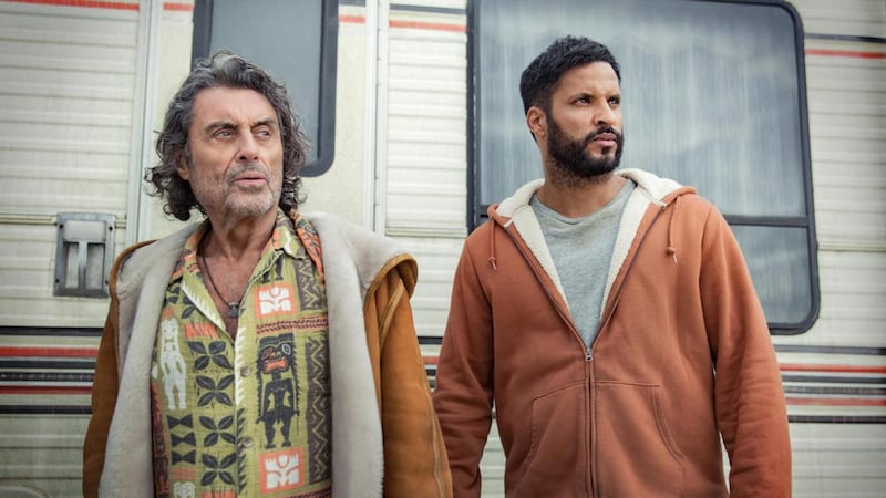 Ian McShane and Ricky Whittle in American Gods