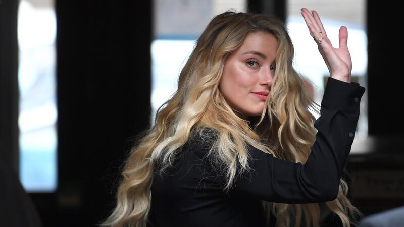 Amber Heard had no part in bringing the case, no say in how it was conducted, and was ostensibly there only as a witness. Photograpah: EPA/Neil Hall