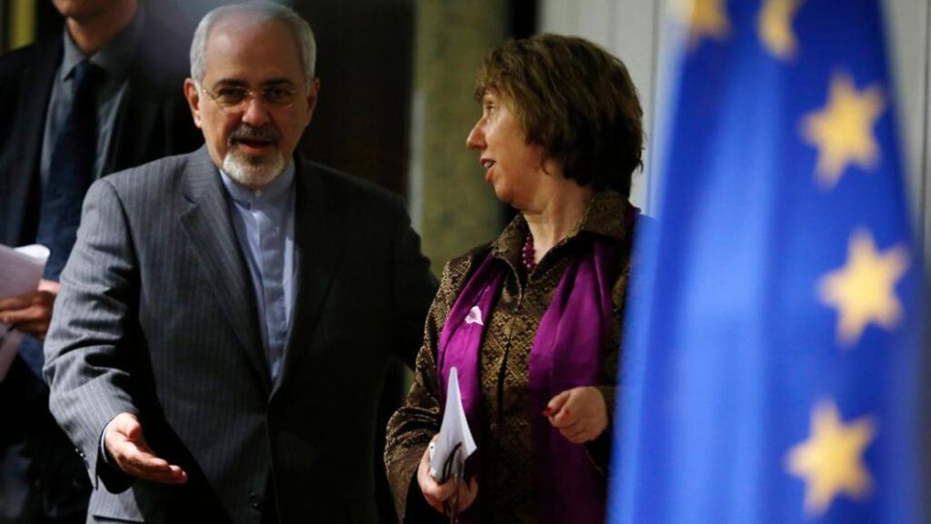 European Union foreign policy chief Catherine Ashton and Iranian foreign minister Mohammad Javad Zarif arrive at a news conference at the end of the Iranian nuclear talks in Geneva. Photograph: Jason Reed /Reuters
