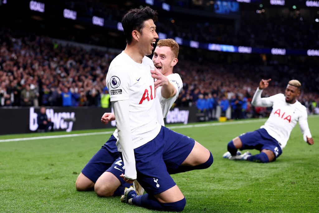 Heung-Min Son of Spurs celebrates with Dejan Kulusevski after scoring the side's third goal during the Premier League match against Arsenal at Tottenham Hotspur Stadium on May 12th, 2022. Photograph: Clive Rose/Getty Images