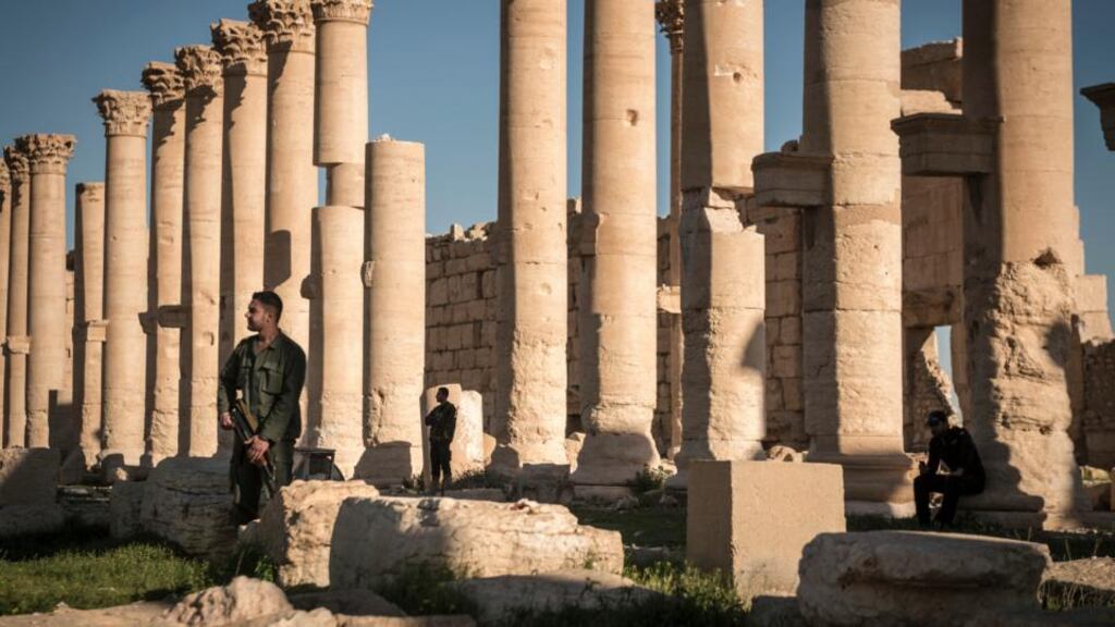Syrian soldiers guard the Temple of Bel in Palmyra before its capture this week. Photograph: Sergey Ponomarev/New York Times