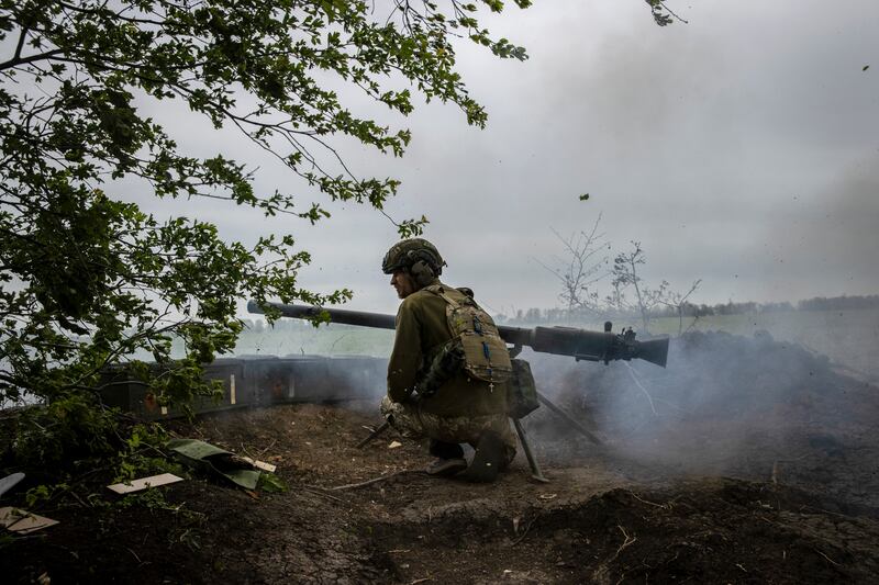 Members of the Ukrainian 28th Mechanized Brigade fire a SPG-9 recoilless gun at a Russian target in the direction of Bakhmut in eastern Ukraine. Photograph: Tyler Hicks/New York Times)