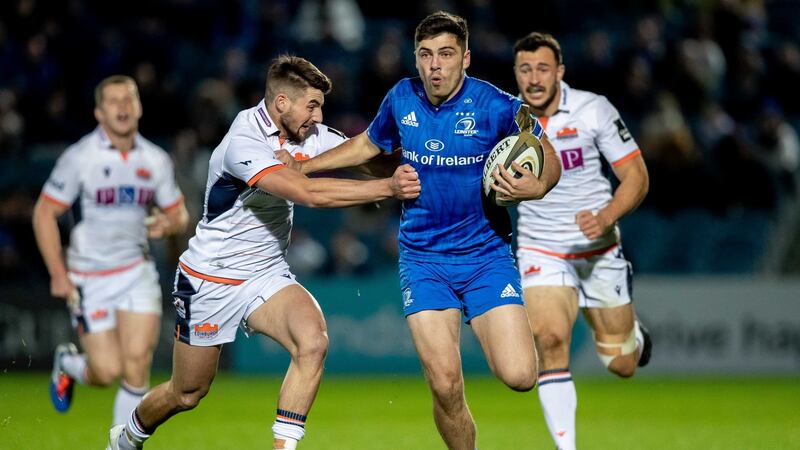 Leinster’s Jimmy O’Brien tries to brush off the challenge of Edinburgh’s  Charlie Shiel during the Guinness Pro 14 game at the  RDS. Photograph: Morgan Treacy/Inpho