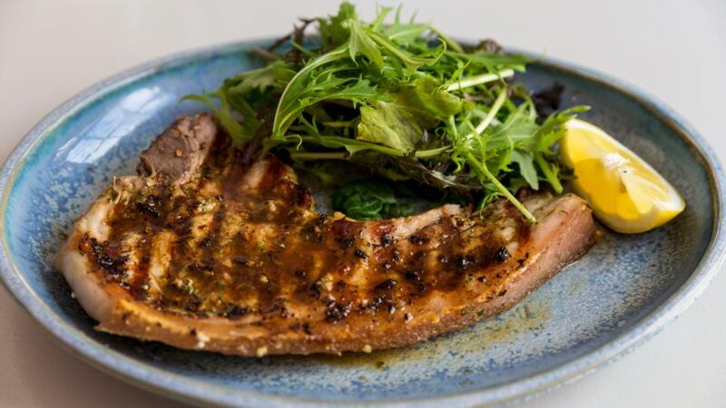 Portuguese pork chops. Photograph: Emma Jarvis