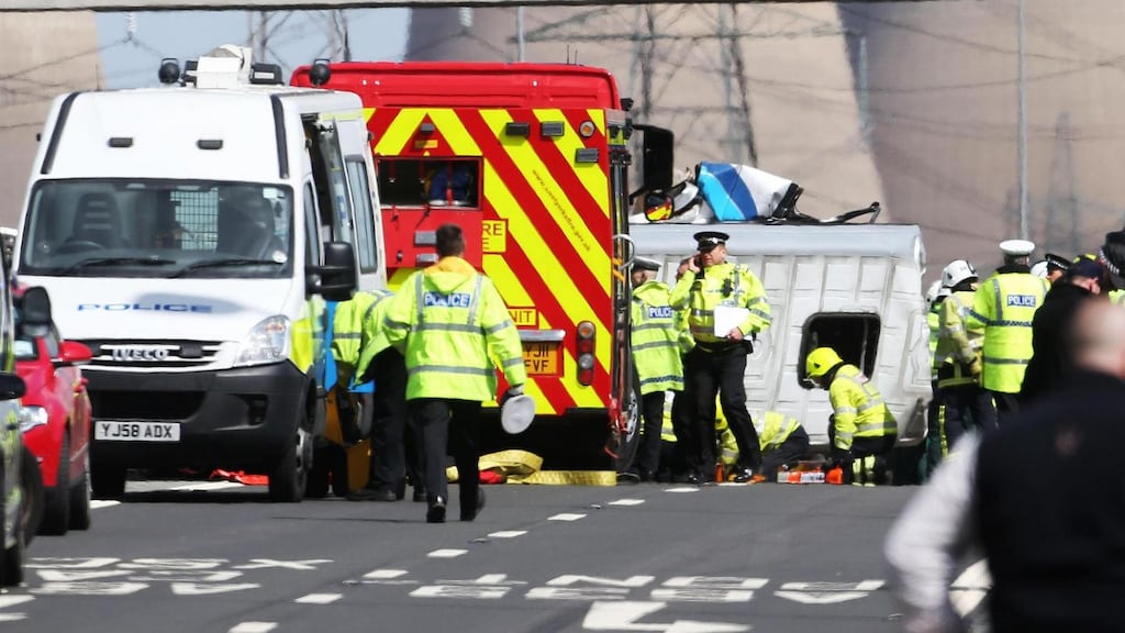 The scene where a woman died in a collision on the westbound carriage of the M62 near Pontefract in West Yorkshire between a lorry and a minibus today. Photograph: Lynne Cameron/PA Wire