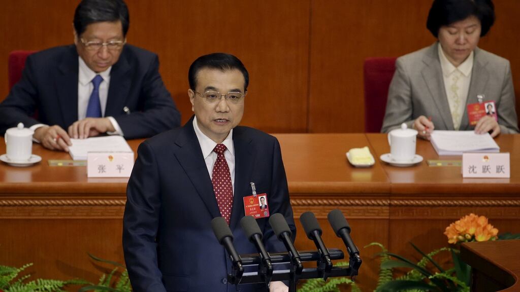 China’s premier Li Keqiang gives a speech during the opening session of the National People’s Congress.