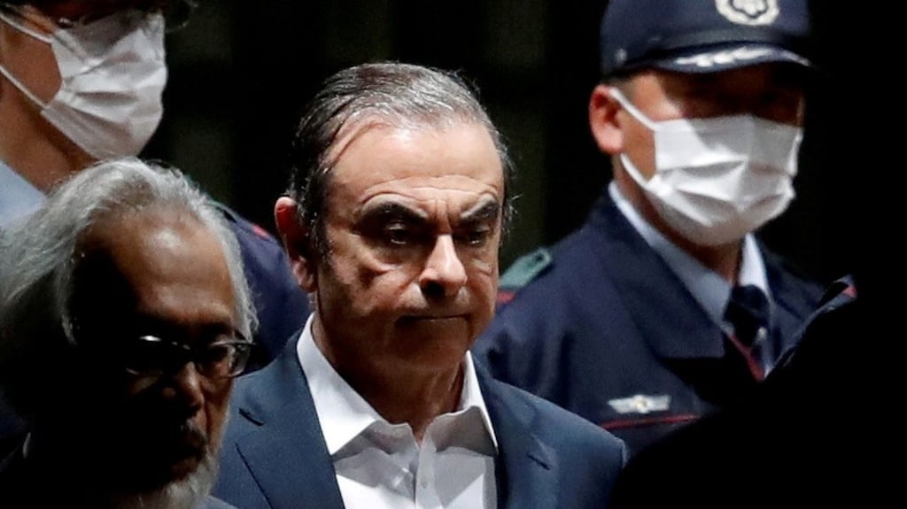 Former Nissan Motor Chariman Carlos Ghosn leaves the Tokyo Detention House in Japan. Photograph: Issei Kato