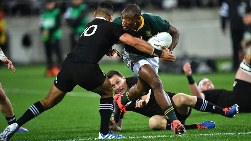 South Africa’s Makazole Mapimpi is tackled by New Zealand’s Richie Mo’unga during the Rugby Championship match at Westpac Stadium in Wellington. Photograph: Marty Melville/AFP/Getty Images