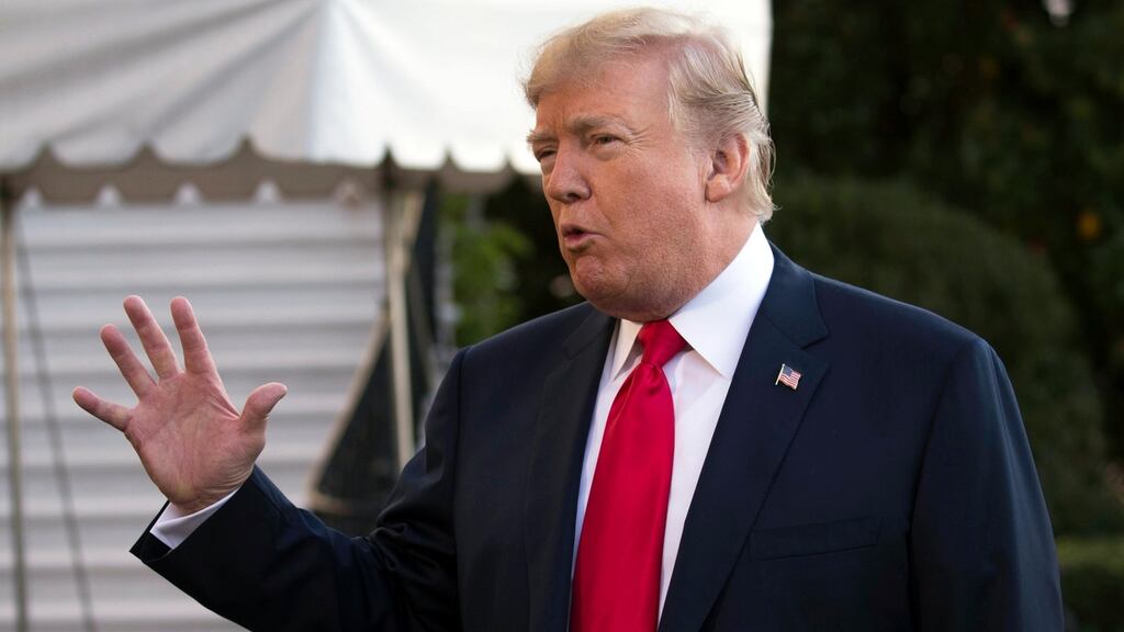 US president Donald Trump responds to a question from the news media prior to boarding Marine One on the South Lawn of the White House in Washington, DC. Photograph: Shawn Thew/EPA