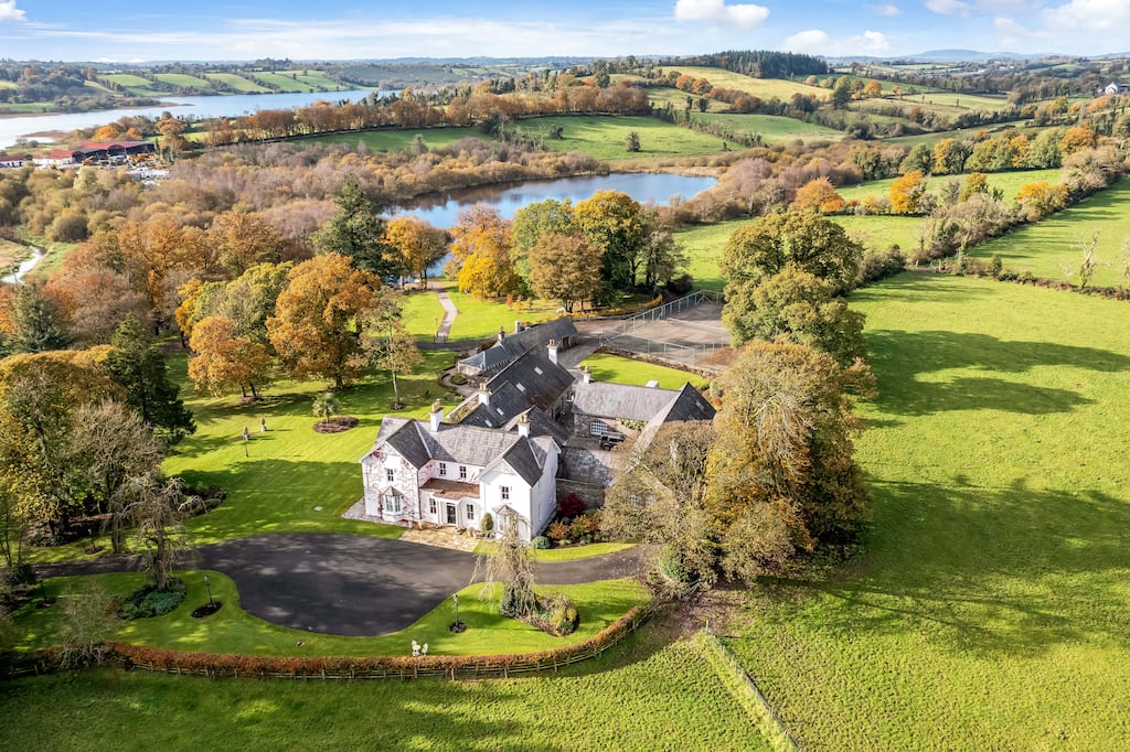 The Grange has an abundance of native trees and a private lake on its six acres