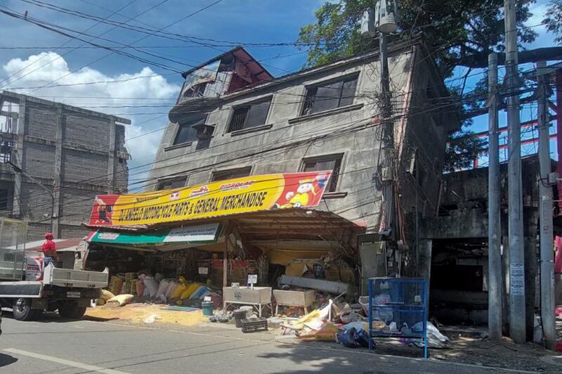 A collapsed building in Bangued, Abra province. Photograph: AP