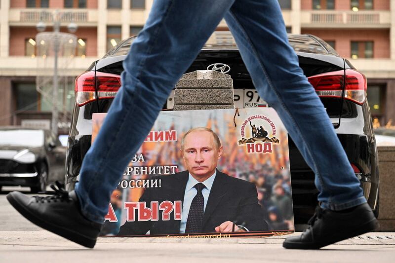 A placard in central Moscow with the text: 'We are with him for the sovereignty of Russia! And you?' Photograph: Kirill Kudrayetsev/AFP via Getty