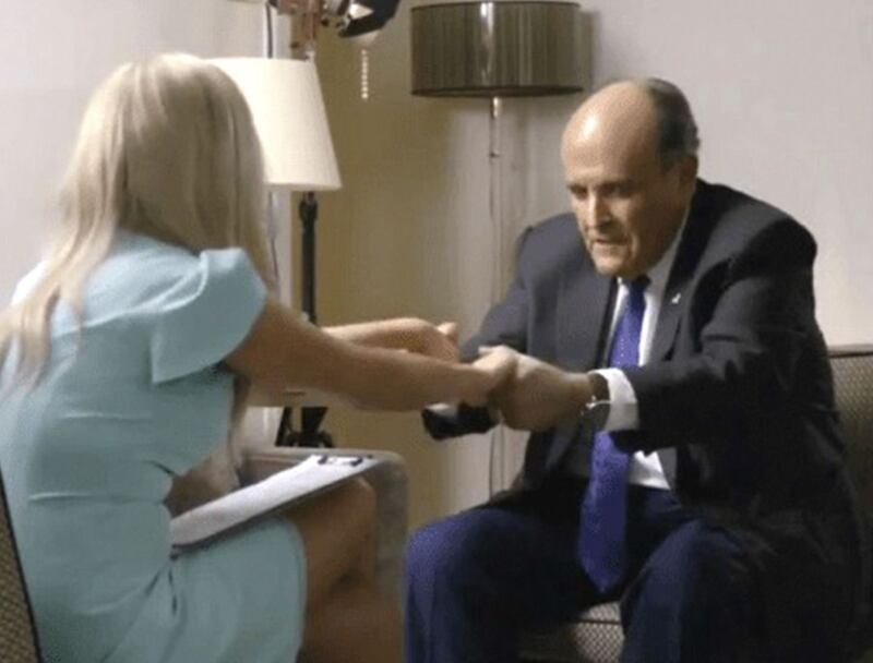 Borat Subsequent Moviefilm: Maria Bakalova with Rudy Giuliani. Photograph: Amazon Studios