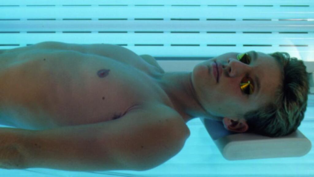 The Irish Cancer Society has said that legislation governing the use of sunbeds in Ireland has not gone far enough despite barring anyone under the age of 18 from using a public facility.