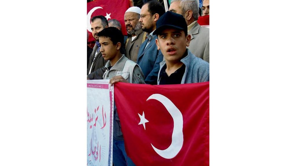 Palestinian supporters of during a demonstration at the Egyptian representative office