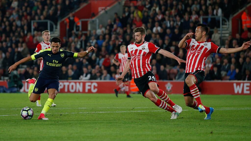 Arsenal’s Alexis Sanchez shoots to score a goal in the Premier League game against Southampton at St Mary’s Stadium. Photograph: Andrew Couldridge/Action Images via Reuters/Livepic