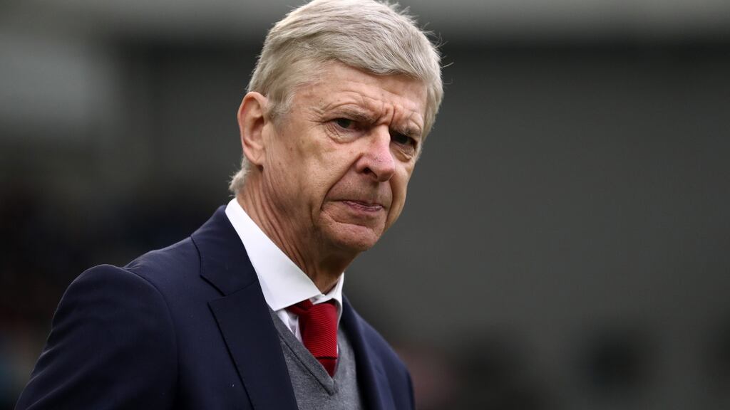 Arsenal manager Arsene Wenger heard the travelling fans call for him to leave during a dismal first half at the Amex Stadium. Photograph: Catherine Ivill/Getty Images