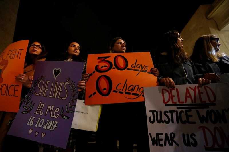 A silent protest and vigil held in memory of murdered investigative journalist Daphne Caruana Galizia. Photograph: Reuters