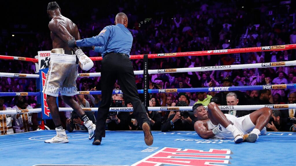 Deontay Wilder walks away after knocking down Luis Ortiz in their heavyweight title boxing match in Las Vegas. Photograph: AP