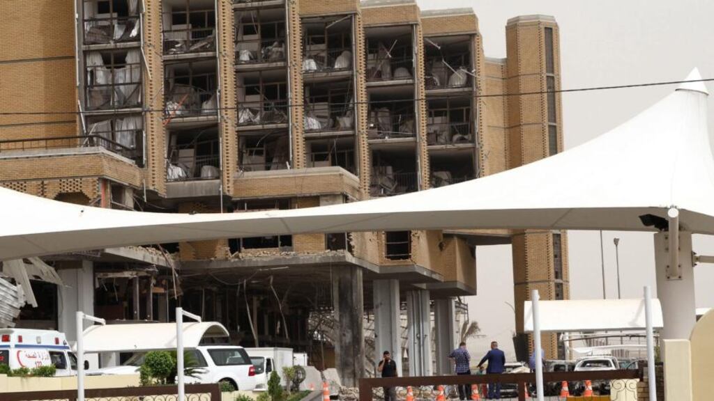 Iraqi police at the entrance of Babil (Babylon) hotel in Baghdad where a car bomb attack killed six people and wounded at least 14 others on Thursday night. Photograph: Ali Abbas/EPA.
