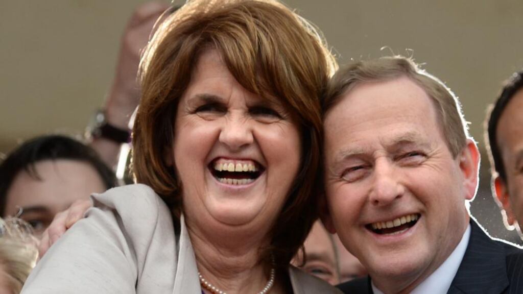 Tánaiste Joan Burton and Taoiseach Enda Kenny in the courtyard at Dublin Castle for the results of the referendum on marriage equality. Photograph: Dara Mac Dónaill/The Irish Times