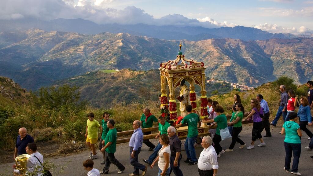 A religious procession in Roccafiorita, Sicily. The average age of its 187 inhabitants is over 60 and the worry is that if Covid spread among its population, the village might disappear. Photograph: Riccardo Lombardo/Getty Images