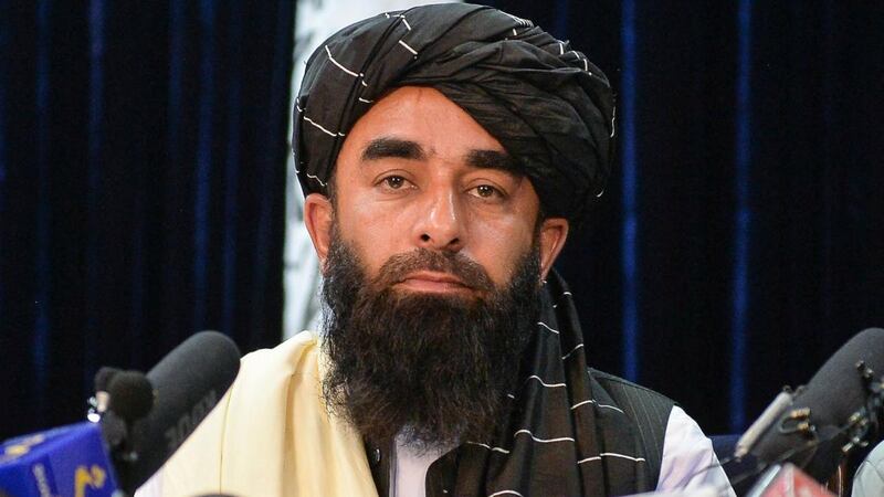 Taliban spokesman Zabihullah Mujahid addresses the first press conference in Kabul following the Islamists’ takeover of Afghanistan. Photograph: Hoshang Hashimi/AFP via Getty Images
