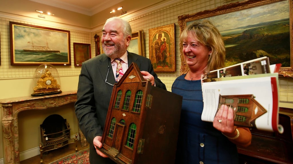 Fonsie Mealy and Tara’s Palace treasurer Jenny Johnston with the doll’s house that was sold by the children’s charity for €48,000. Photograph: Nick Bradshaw