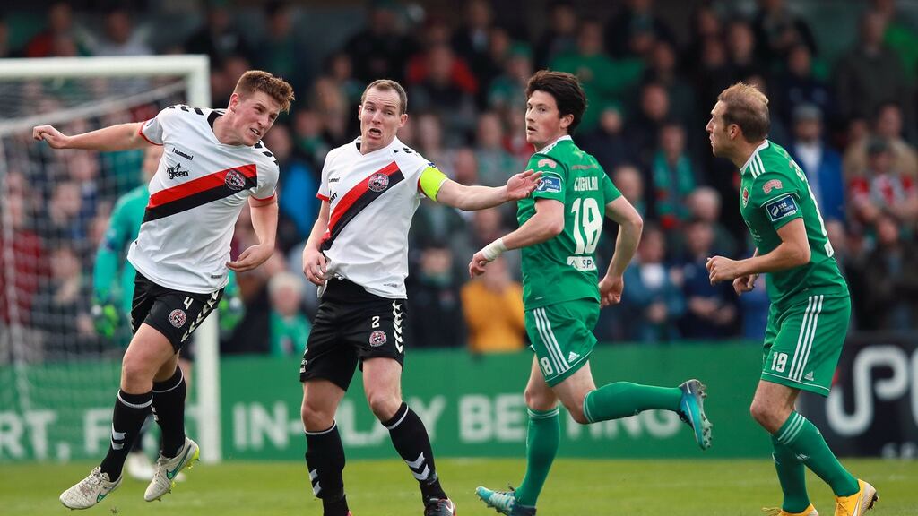 Bohemians’ Dan Casey clears the ball during the FAI Cup semi-final against Cork City. Photograph: Tommy Dickson/Inpho