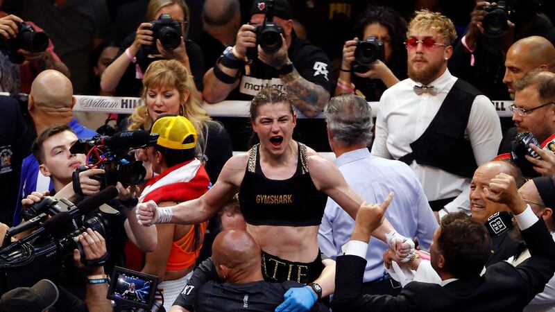 Katie Taylor celebrates after winning by a split decision the undisputed World Lightweight Championship over  Amanda Serrano  at Madison Square Garden in New York. Photograph: Jason Szenes/EPA
