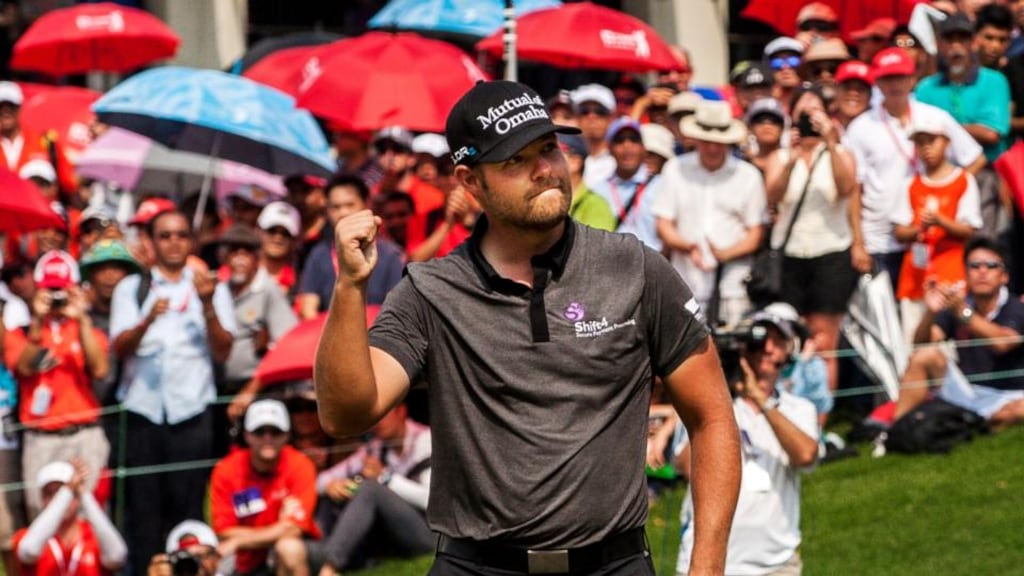 America’s Ryan Moore  celebrates after defending his  CIMB Classic golf tournament title in Kuala Lumpur, Malaysia. Photograph:  Azhar Rahim/EPA